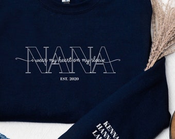 Personalized I wear my heart on my sleeve custom NANA Sweatshirt with Kid Name on Sleeve,grandma EST gift,Nana Sweatshirt,gift for her