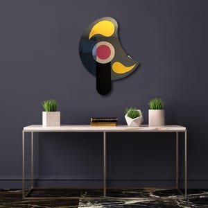 ABSTRACT  Unique acrylic mirror wall art featuring vibrant colors and dynamic, modern geometric design