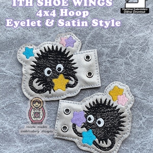May include: Two silver 4x4 inch embroidery designs of a black fuzzy creature with big eyes holding a star. The designs are for machine embroidery and include eyelets and satin stitching. The text "ITH SHOE WINGS" is at the top of the image.