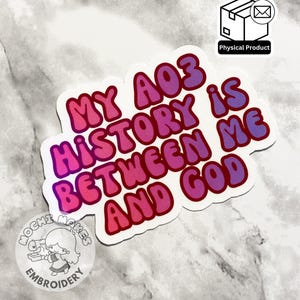 May include: A sticker with the text "MY A03 HISTORY IS BETWEEN ME AND GOD" in pink and purple bubble letters. The sticker has a white border and a small logo in the bottom left corner. A "Physical Product" icon is in the top right.