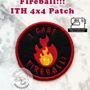 May include: A circular, black embroidered patch with a red border and a red and yellow flame design. The text "I CAST FIREBALL" is embroidered on the patch. The patch is labelled "Fireball!!! ITH 4x4 Patch".