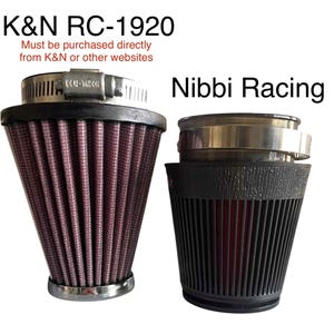 May include: Two air filters, one labeled K&N RC-1920 and the other Nibbi Racing. The K&N filter has a red filter element and a silver clamp. The Nibbi Racing filter is black with a red filter element. Text on the image states "Must be purchased directly from K&N or other websites."