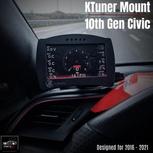 May include: Black KTuner Mount for 10th Gen Civic. The digital display shows various readings, including IAT, ECT, and boost pressure. The text "Designed for 2016-2021" is visible at the bottom. The car's interior is visible in the background.