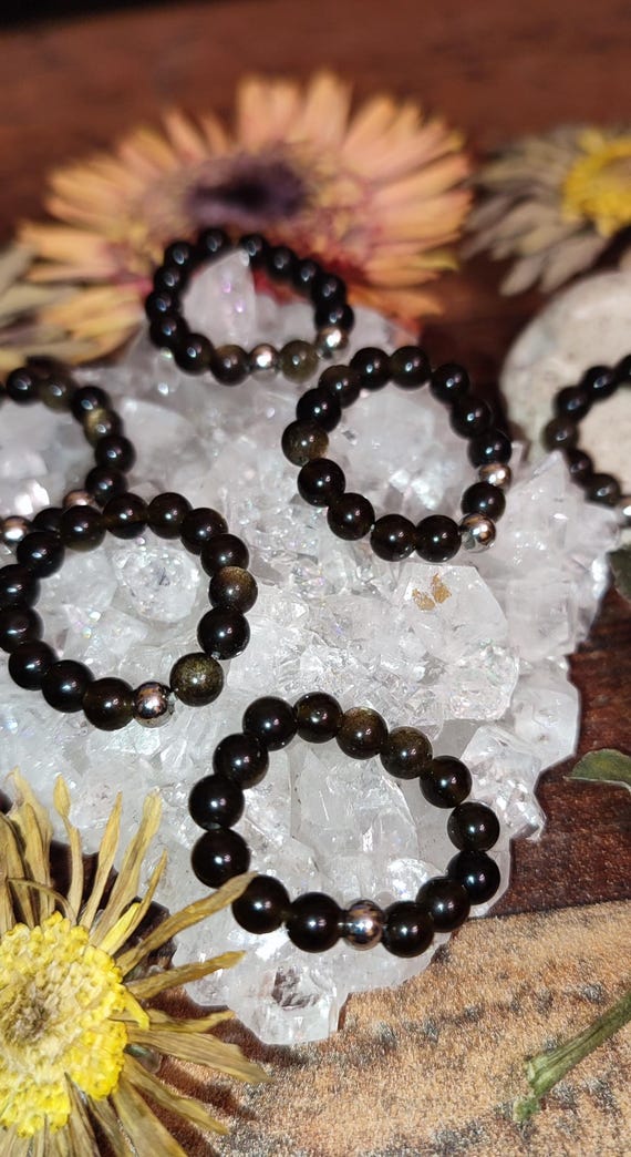 Ring Made From Gold Obsidian on Elastic Rubber Band