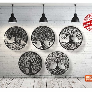 May include: Set of five black metal wall decor pieces featuring different tree of life designs. Each piece is circular and has a detailed intricate design.