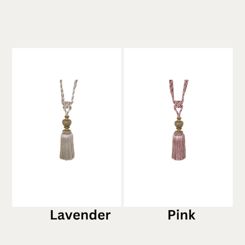 May include: Two curtain tiebacks with tassels. The tieback on the left is lavender and the tieback on the right is pink.