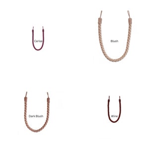 May include: Four different colors of twisted rope curtain tiebacks. The colors are cerise, blush, dark blush, and wine.