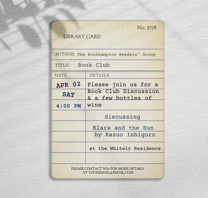 May include: A beige library card-style invitation for a book club meeting. The card features details including the date, time, and location, and the book to be discussed, "Klara and the Sun" by Kazuo Ishiguro. The text is in blue.
