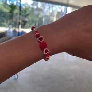 Red ‘Cupid’ bracelet TELL ME: your age / the persons who’s getting its AGE for the size.( Cupid,Valentines,Clay beads,bead,strength,cool)