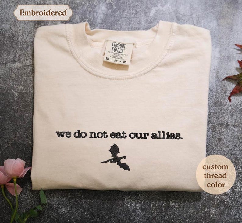 a t - shirt with the words we do not eat our allies on it