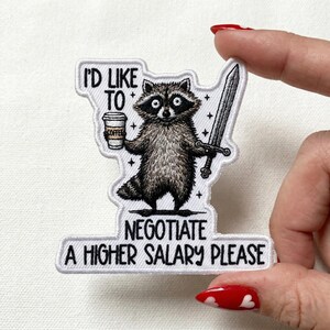 May include: A set of three ceramic mugs with a speckled, matte finish. The mugs are in shades of cream, light gray, and dark gray. Each mug has a simple, minimalist design, perfect for coffee or tea.