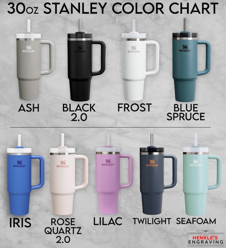 May include: A 30oz Stanley color chart displaying nine tumblers with handles and straws in various colors labeled Ash, Black 2.0, Frost, Blue Spruce, Iris, Rose Quartz 2.0, Lilac, Twilight, and Seafoam, with the Henkle's Engraving logo at the bottom.