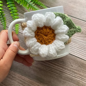 Crochet Daisy Dream Mug Cozy, Hand- Crocheted Mug Cozy - Cozy Up Your Mornings With A Touch Of Sunshine