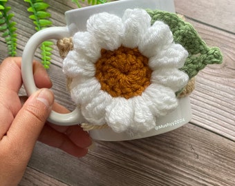 Crochet Daisy Dream Mug Cozy, Hand- Crocheted Mug Cozy - Cozy Up Your Mornings With A Touch Of Sunshine