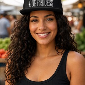 May include: A black baseball cap featuring a rhinestone design on the front. The text reads I [heart symbol] DUE PROCESS, with the heart in red rhinestones and the letters in silver rhinestones, creating a sparkling effect on the dark fabric.