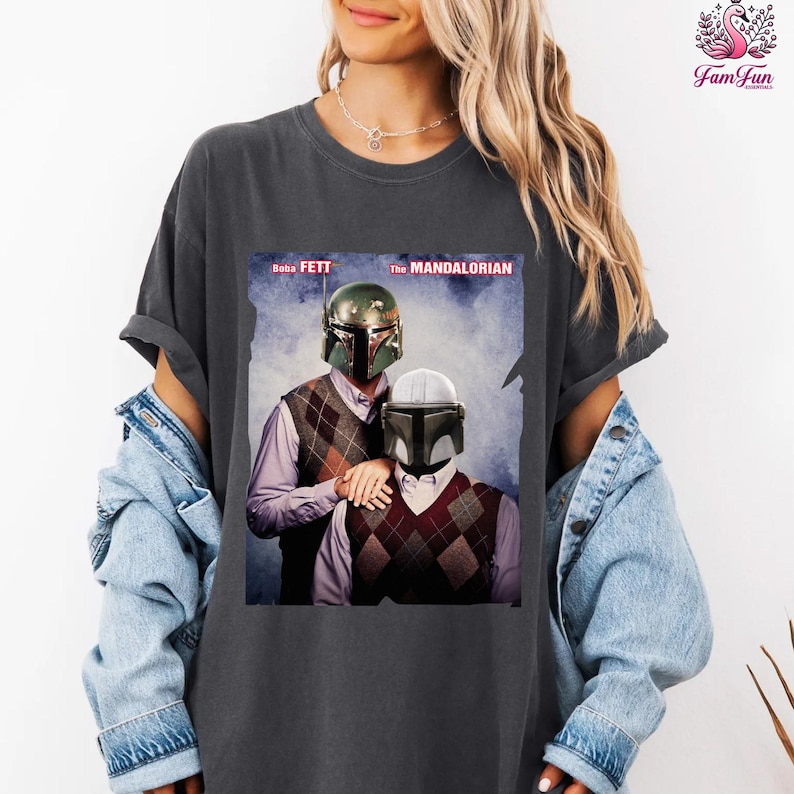 A woman wearing a t-shirt with a graphic design featuring two characters from the Star Wars franchise, Boba Fett and the Mandalorian.