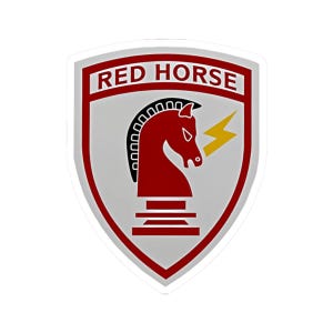 May include: A red and white shield with the text "RED HORSE" at the top. A red chess piece in the shape of a horse's head with a yellow lightning bolt behind it is in the center of the shield.