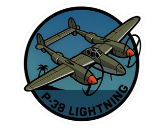 May include: A sticker featuring a stylized illustration of a P-38 Lightning aircraft. The olive-green plane has orange propeller tips and is set against a blue sky with a palm tree. The words "P-38 LIGHTNING" are printed in white.