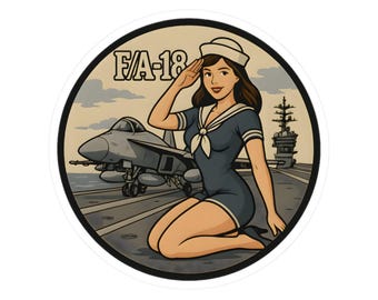 May include: A round sticker featuring a vintage-style illustration. It depicts a woman in a sailor outfit saluting, with an F/A-18 fighter jet and a carrier in the background. The color palette includes shades of blue, tan, and gray.