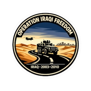 May include: A circular sticker featuring the text "OPERATION IRAQI FREEDOM" in a black border. The image depicts a military vehicle on a road through a desert landscape, with a helicopter in the sky. The text "IRAQ 2003-2010" is at the bottom.
