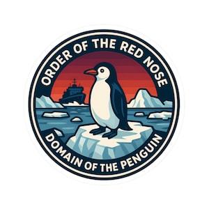 May include: Circular sticker featuring a penguin standing on an iceberg, with a ship in the background. The sticker has a blue border with the text "ORDER OF THE RED NOSE" and "DOMAIN OF THE PENGUIN". The background shows an arctic scene with icebergs and a red and orange sky.