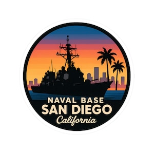 May include: Circular sticker featuring a silhouette of a naval ship, palm trees, and a cityscape against a sunset backdrop. The text reads "Naval Base San Diego California" in a bold, white font, with a black border.