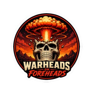 May include: A round sticker featuring a skull with an atomic explosion erupting from its head. The design is set against a fiery orange and red background with the words "WARHEADS ON FOREHEADS" in bold white and red text.