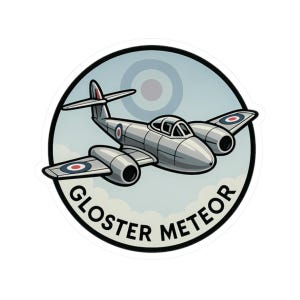 May include: A sticker featuring a cartoon illustration of a Gloster Meteor jet aircraft. The silver plane has roundels on the wings and tail, set against a light blue sky with a target design. The words "GLOSTER METEOR" are in a black font.