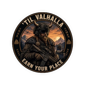 May include: A circular sticker featuring a bearded warrior in a tactical helmet with horns, holding a rifle. The background shows mountains and a Viking ship at sunset. The text reads 'TIL VALHALLA' and 'EARN YOUR PLACE' with runic symbols.
