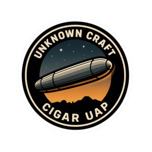 May include: A circular sticker featuring a stylized illustration of a cigar-shaped object against a night sky and sunset backdrop. The text "UNKNOWN CRAFT" and "CIGAR UAP" are printed around the image in a bold, sans-serif font.