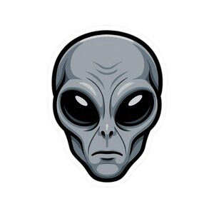May include: A grey alien head sticker with large black eyes, a small nose, and a thin mouth. The alien has a smooth, grey complexion and a black outline. The sticker is on a white background.