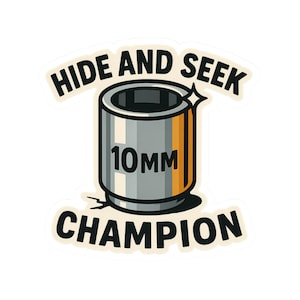 May include: A sticker featuring a silver and orange socket wrench with the text "10MM" and the words "HIDE AND SEEK CHAMPION" in a bold font. The design has a cartoon style with a white background.