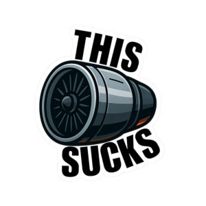 May include: A sticker featuring a stylized jet engine illustration in shades of gray and black. The text "THIS" is above the engine, and "SUCKS" is below it, both in bold black font.