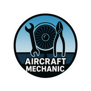 May include: A round sticker with a blue and black design featuring a wrench, pliers, and a turbine engine. The words "AIRCRAFT MECHANIC" are printed in white across the bottom of the sticker.