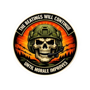 May include: A circular sticker featuring a skull wearing a military helmet and headset. The skull is set against a fiery orange and yellow background with barbed wire and trees. The text reads "THE BEATINGS WILL CONTINUE" and "UNTIL MORALE IMPROVES".