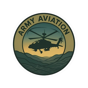 May include: A round sticker featuring a silhouette of a helicopter against a sunset backdrop. The words "ARMY AVIATION" are in a circular design around the helicopter. The sticker has a white border and a green, yellow, and blue color scheme.