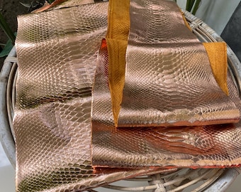 Piel de pitón auténtica en oro rosa