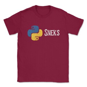 May include: A maroon t-shirt with a vintage-style Python logo and the text "SNEKS" printed on the front.