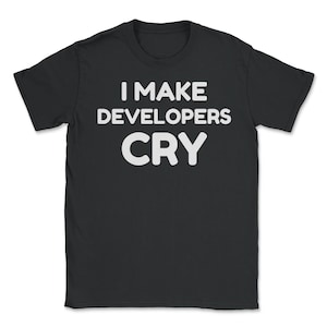 May include: Black t-shirt with white text that reads "I make developers cry."