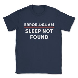 May include: A navy blue t-shirt with white text that reads "ERROR 4:04 AM SLEEP NOT FOUND" with a red line above the text.