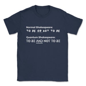May include: A navy blue t-shirt with white text that reads "Normal Shakespeare: TO BE OR NOT TO BE" and "Quantum Shakespeare: TO BE AND NOT TO BE".