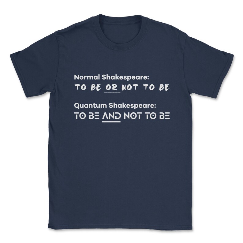 May include: A navy blue t-shirt with white text that reads "Normal Shakespeare: TO BE OR NOT TO BE" and "Quantum Shakespeare: TO BE AND NOT TO BE".