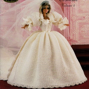 May include: Crochet pattern for a 20th Century Royal Wedding Gown. The pattern includes a gown, train, tiara, veil, bouquet, panties, shoes, and garter. The pattern is from Crochet Collector Costume Volume 4, P-011.