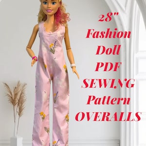 May include: A 28-inch fashion doll wearing a pink floral print jumpsuit. The doll has blonde hair with pink highlights and is accessorized with a pink headband and bracelets. The image includes text that reads "Fashion Doll PDF Sewing Pattern Overalls."