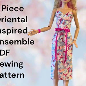 May include: A doll wearing a three-piece, Oriental-inspired ensemble. The dress features a colorful floral pattern with a pink ribbon belt. The image includes the text "3 Piece Oriental Inspired Ensemble PDF Sewing Pattern."