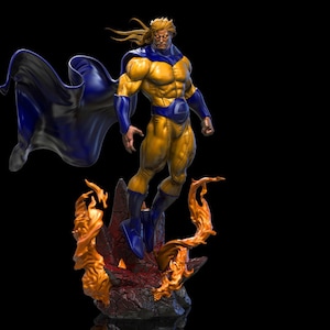 May include: A detailed figurine of a superhero in a dynamic pose, featuring a yellow and blue costume with a flowing cape. The figure is set against a black background, with fiery elements at the base.