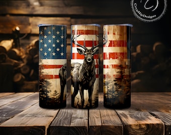 May include: Three stainless steel tumblers with a distressed American flag design and a deer silhouette. The tumblers are on a wooden surface.
