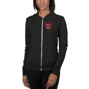 May include: A black zip-up hoodie with a red and white graphic on the left chest. The graphic features a motorcycle and the text "TRUE LOVE IS WILD".