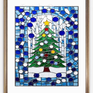 May include: Stained glass artwork depicting a Christmas tree with a yellow star, adorned with colourful baubles. The tree is set against a blue and white mosaic background, framed in gold. A festive holiday decoration.