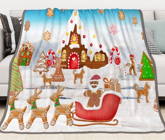 Two two-sided gingerbread scene blanket